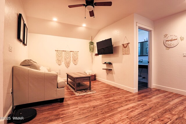 washroom featuring cabinet space, visible vents, baseboards, dark wood-type flooring, and stacked washing maching and dryer