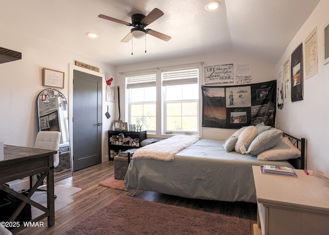 bedroom with recessed lighting, dark wood-style flooring, vaulted ceiling, and ceiling fan