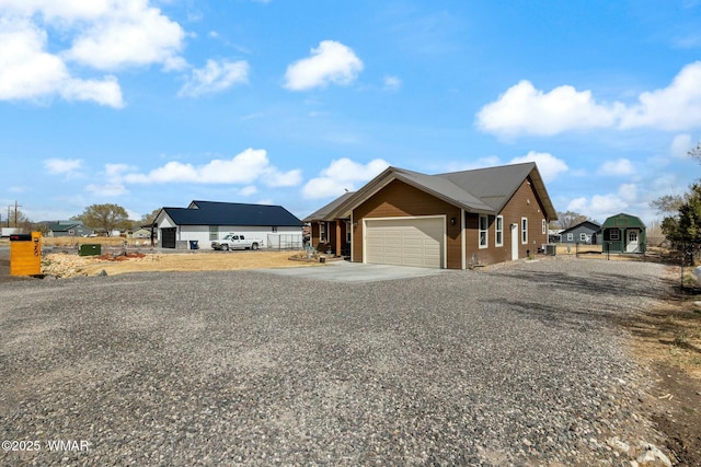 view of front of home featuring a garage and driveway