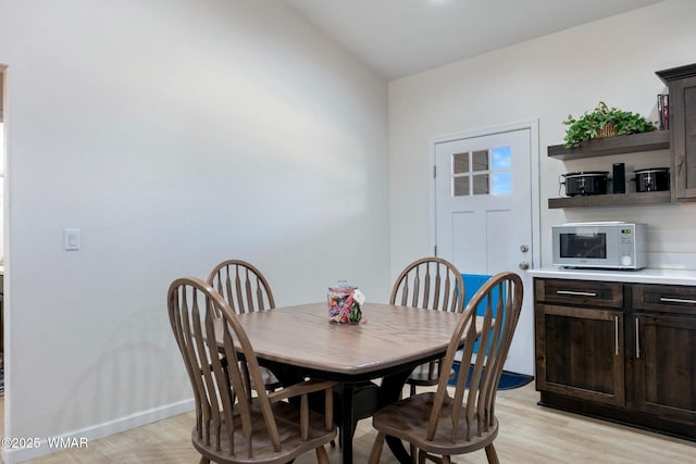 dining room featuring light wood-style flooring