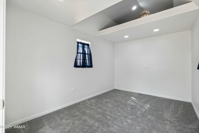 spare room featuring recessed lighting, baseboards, lofted ceiling, and carpet floors