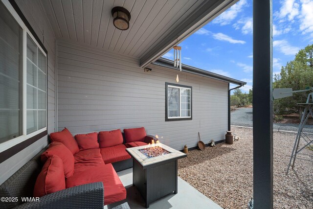 6668 Bandido Way, Show Low, AZ 85901 - view of patio featuring an outdoor living space with a fire pit