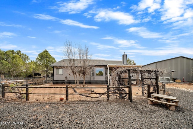 6668 Bandido Way, Show Low, AZ 85901 - view of front of home with a chimney and fence private yard