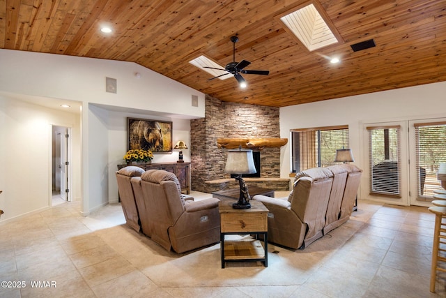 living room featuring a skylight, recessed lighting, ceiling fan, high vaulted ceiling, and wooden ceiling