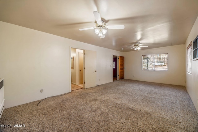 4747 Hidden Way Spur, Show Low, AZ 85901 - unfurnished bedroom featuring carpet flooring and ceiling fan