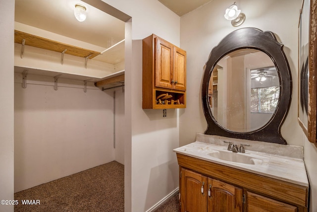 4747 Hidden Way Spur, Show Low, AZ 85901 - bathroom with vanity, a ceiling fan, and baseboards
