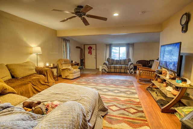 living area with light wood-style floors, recessed lighting, and a ceiling fan