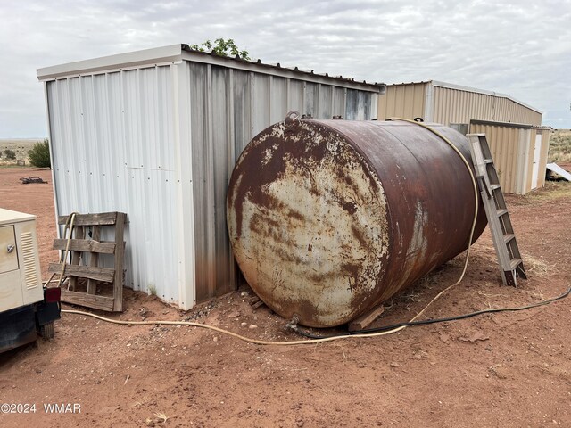 view of outbuilding with heating fuel