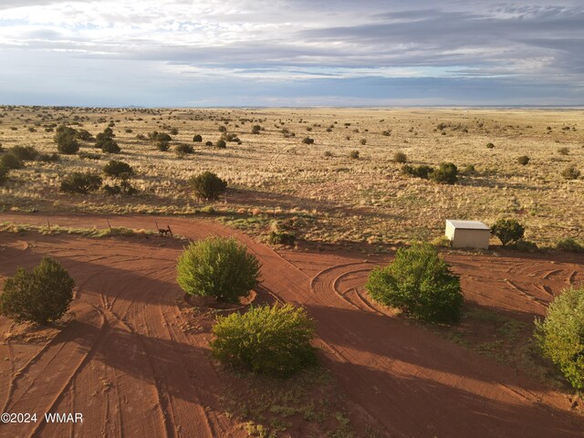 exterior space with a rural view