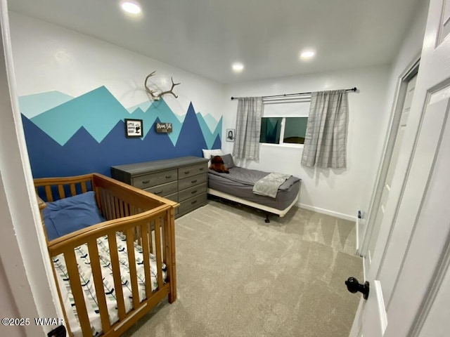 bedroom with baseboards, recessed lighting, and light colored carpet