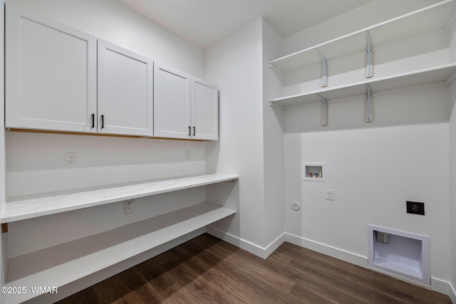 7141 Pair O Dice Rd, Show Low, AZ 85902 - laundry room featuring cabinet space, hookup for an electric dryer, washer hookup, dark wood-type flooring, and baseboards