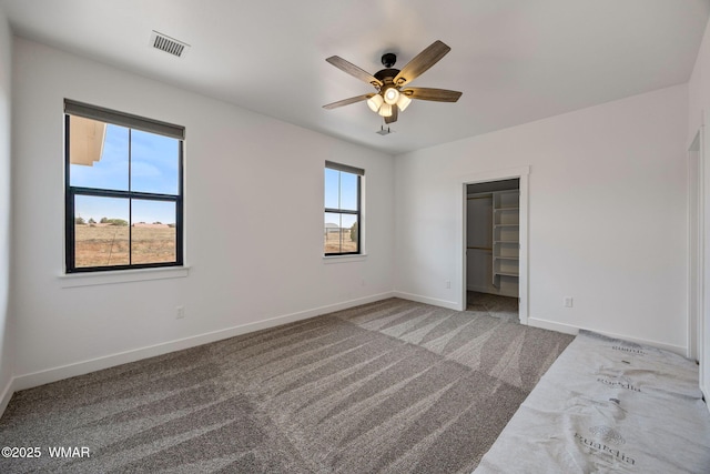 7141 Pair O Dice Rd, Show Low, AZ 85902 - carpeted spare room featuring a ceiling fan and baseboards