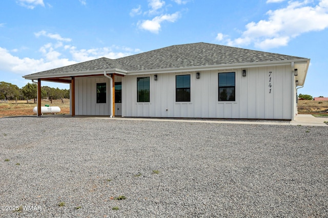 7141 Pair O Dice Rd, Show Low, AZ 85902 - view of front of home featuring roof with shingles and board and batten siding