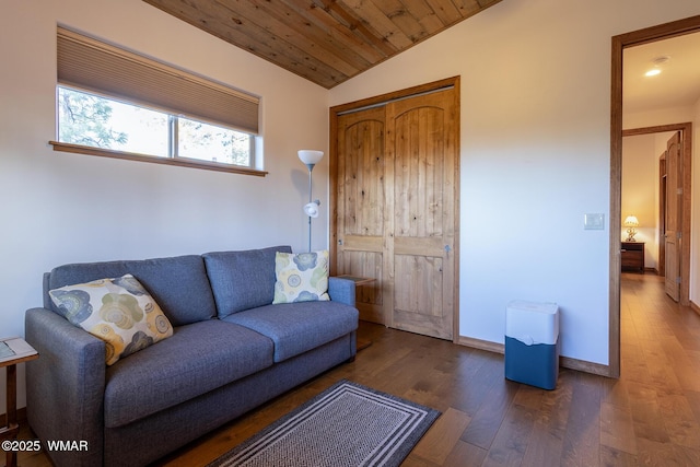 living area with wooden ceiling, baseboards, lofted ceiling, and wood finished floors