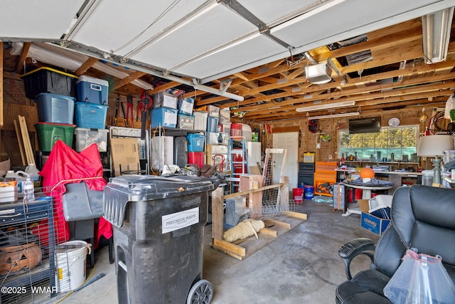 garage featuring a workshop area and a garage door opener