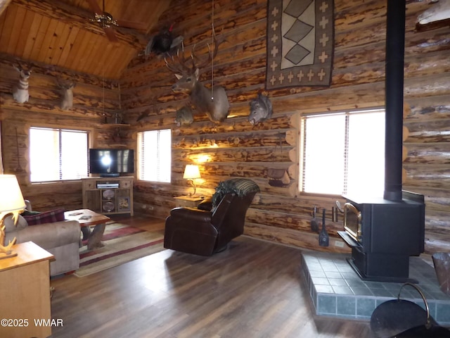 30 County Road 2066, Alpine, AZ 85920 - living area with high vaulted ceiling, wooden ceiling, wood finished floors, a wood stove, and beamed ceiling