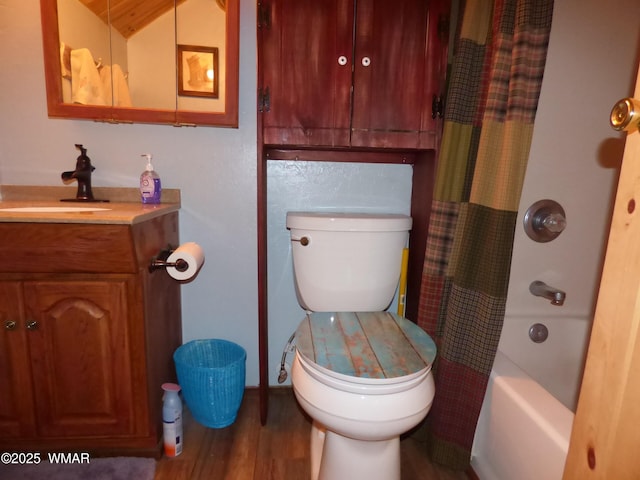 30 County Road 2066, Alpine, AZ 85920 - full bathroom with toilet, vanity, shower / bath combo with shower curtain, and wood finished floors