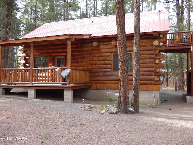 30 County Road 2066, Alpine, AZ 85920 - view of front of property featuring metal roof, covered porch, and log siding