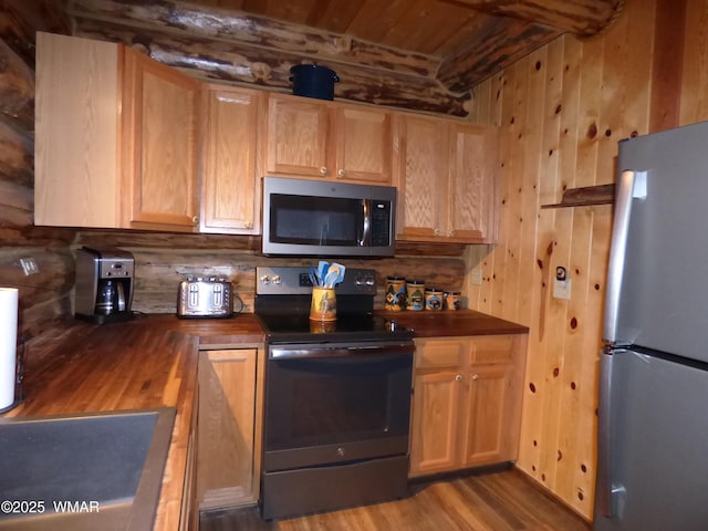 30 County Road 2066, Alpine, AZ 85920 - kitchen with wooden counters, wood ceiling, beam ceiling, appliances with stainless steel finishes, and wood finished floors