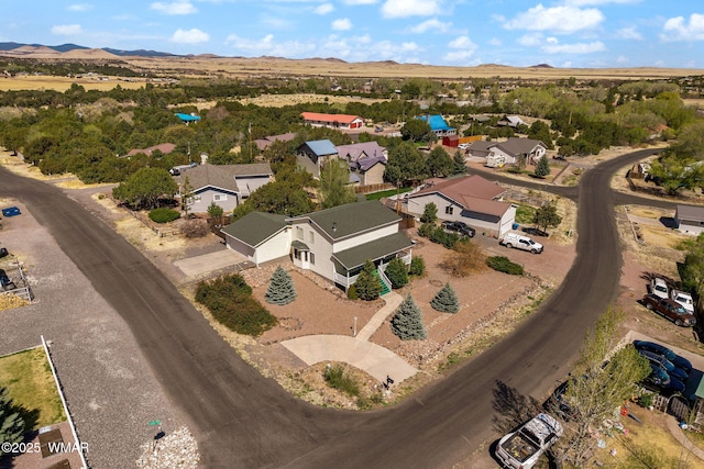 bird's eye view featuring a residential view and a mountain view