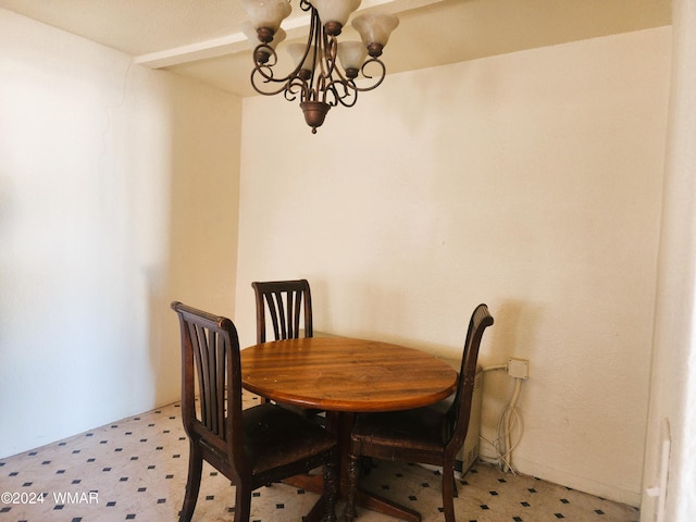 dining room with a chandelier