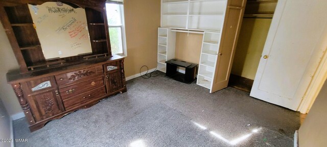 unfurnished bedroom featuring baseboards