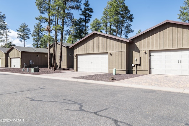 view of front of home featuring driveway and an attached garage