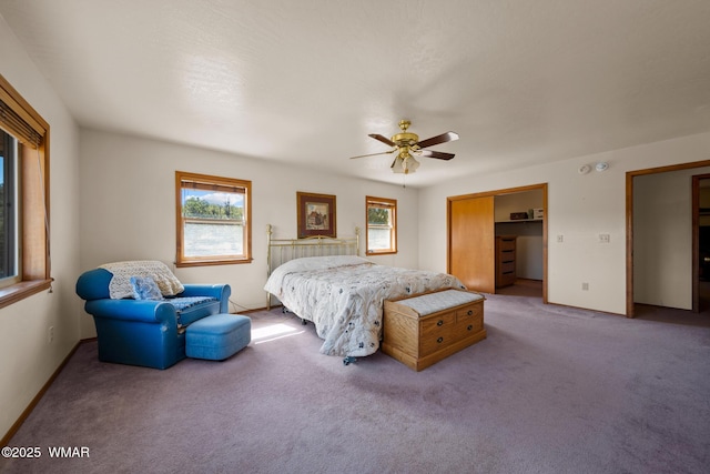 bedroom with carpet, a closet, ceiling fan, and baseboards