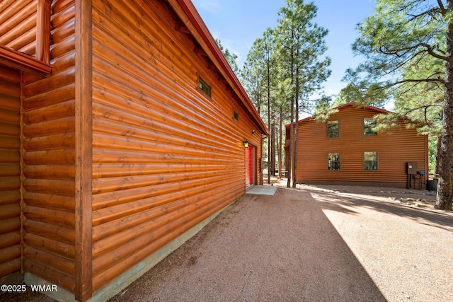 2722 Covered Wagon Trl, Overgaard, AZ 85933 - view of property exterior featuring asphalt driveway