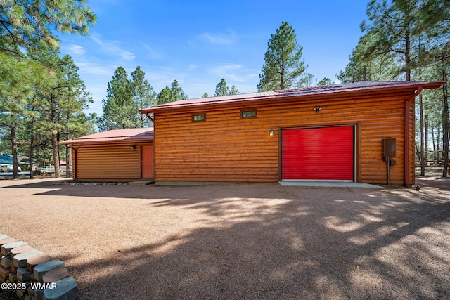 2722 Covered Wagon Trl, Overgaard, AZ 85933 - garage with driveway