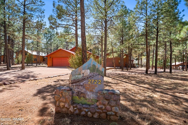 2722 Covered Wagon Trl, Overgaard, AZ 85933 - view of home's exterior with an outdoor structure