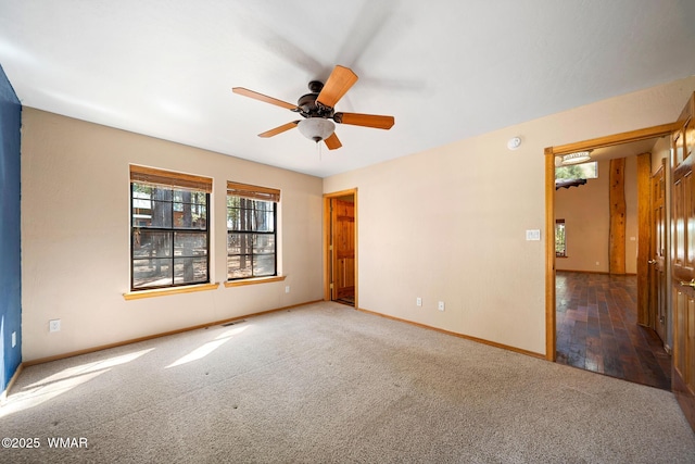 2722 Covered Wagon Trl, Overgaard, AZ 85933 - carpeted empty room with healthy amount of natural light and ceiling fan