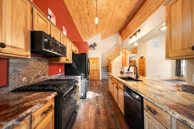 2722 Covered Wagon Trl, Overgaard, AZ 85933 - kitchen with black appliances, wooden ceiling, dark wood finished floors, backsplash, and light stone countertops