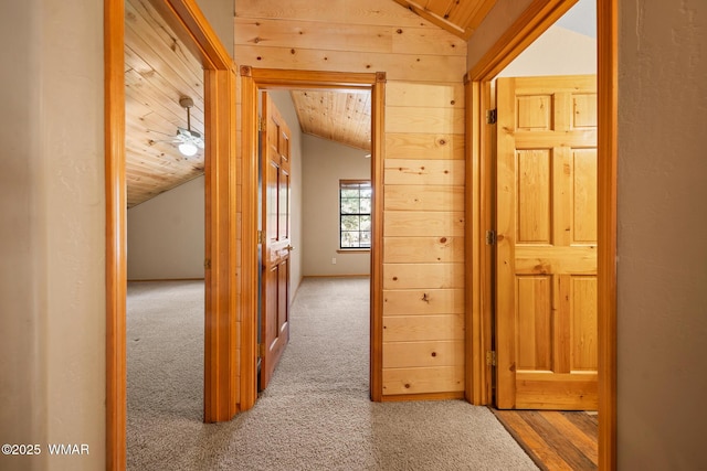 2722 Covered Wagon Trl, Overgaard, AZ 85933 - corridor featuring lofted ceiling, carpet floors, and wood ceiling