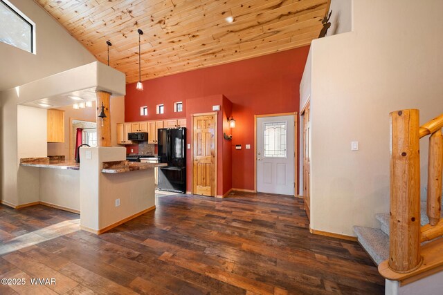 2722 Covered Wagon Trl, Overgaard, AZ 85933 - kitchen with black appliances, high vaulted ceiling, a peninsula, wooden ceiling, and dark wood-type flooring