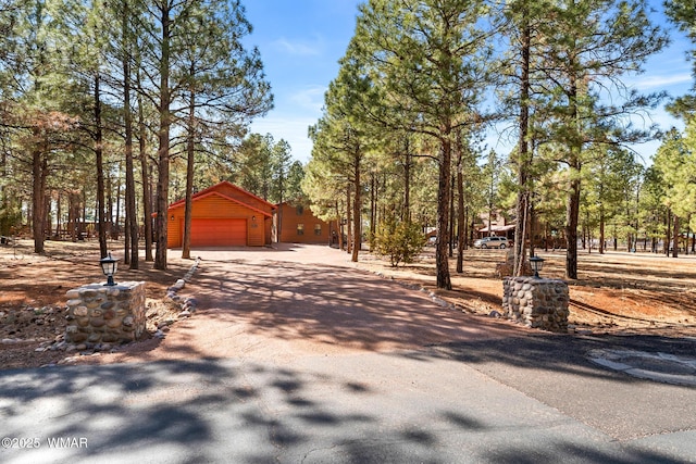 2722 Covered Wagon Trl, Overgaard, AZ 85933 - view of asphalt driveway