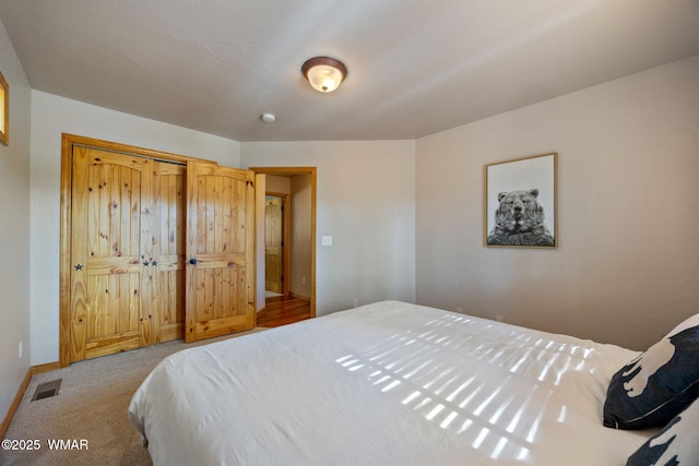 2190 Evergreen Ln, Show Low, AZ 85901 - carpeted bedroom with baseboards and a closet