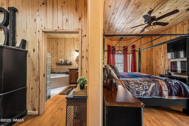 4683 Eagle Nest Ct, Lakeside, AZ 85929 - bedroom with wood walls, hardwood / wood-style flooring, and wooden ceiling