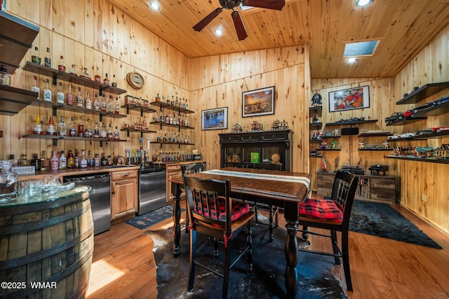 4683 Eagle Nest Ct, Lakeside, AZ 85929 - indoor bar with black dishwasher, wooden ceiling, ceiling fan, wood finished floors, and wood walls