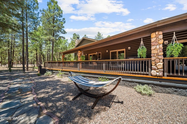 4683 Eagle Nest Ct, Lakeside, AZ 85929 - view of property exterior featuring a chimney and a wooden deck