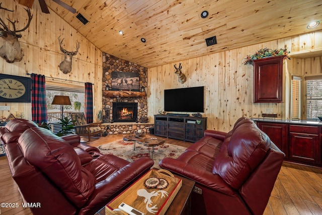 4683 Eagle Nest Ct, Lakeside, AZ 85929 - living area with plenty of natural light, hardwood / wood-style floors, wooden ceiling, wood walls, and high vaulted ceiling