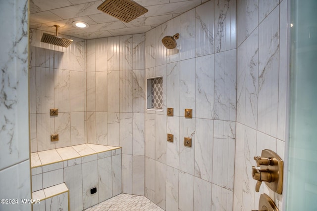 bathroom featuring tiled shower