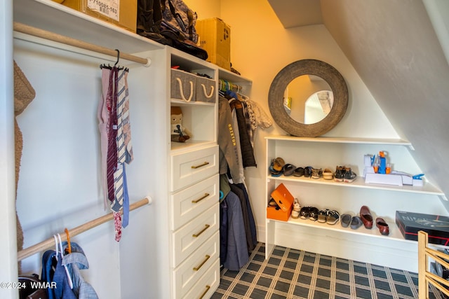 spacious closet featuring tile patterned floors