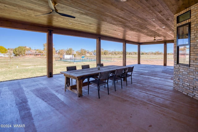 exterior space with wooden ceiling and ceiling fan