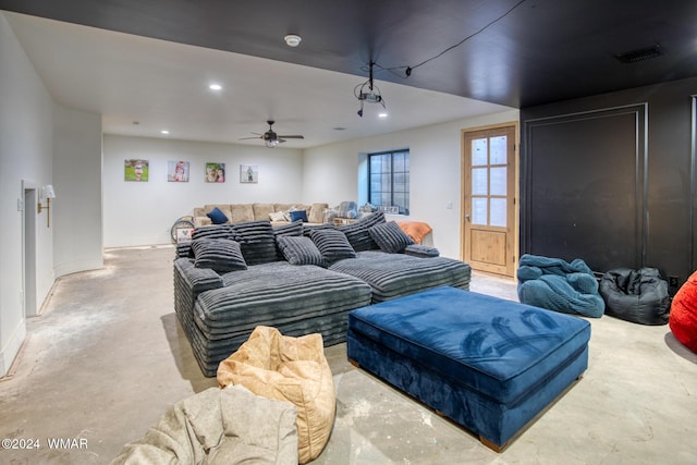 home theater featuring baseboards, visible vents, ceiling fan, concrete floors, and recessed lighting