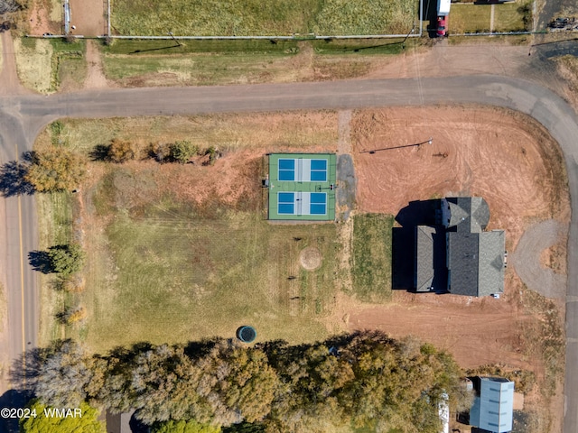 birds eye view of property featuring a rural view