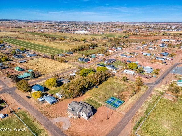 birds eye view of property featuring a rural view