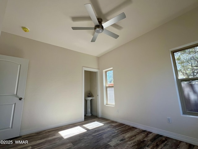 3131 State Route 277, Overgaard, AZ 85933 - empty room featuring dark wood-style flooring, a ceiling fan, baseboards, a smoke detector, and vaulted ceiling