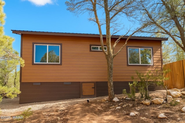 3131 State Route 277, Overgaard, AZ 85933 - view of property exterior featuring crawl space and metal roof