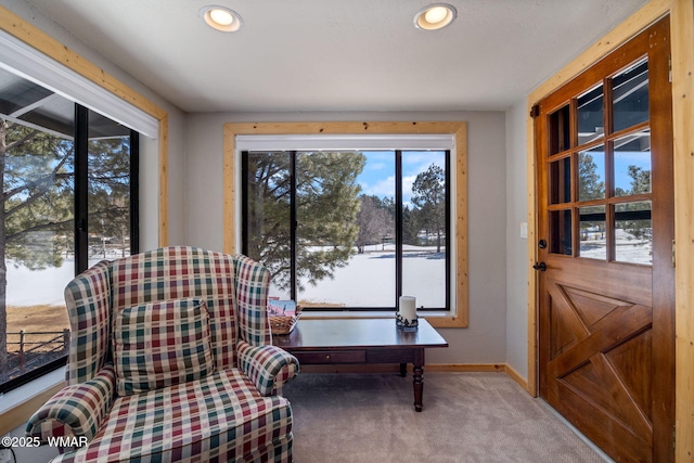 sitting room featuring carpet flooring, recessed lighting, and baseboards